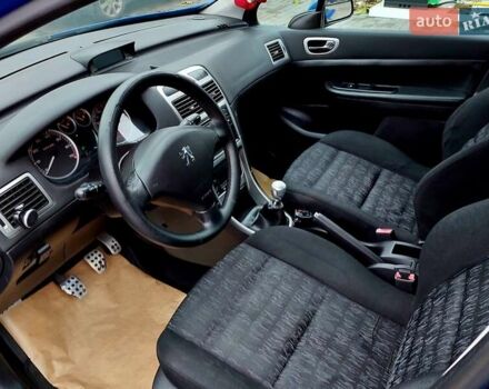 Синий Пежо 307, объемом двигателя 2 л и пробегом 265 тыс. км за 3550 $, фото 6 на Automoto.ua