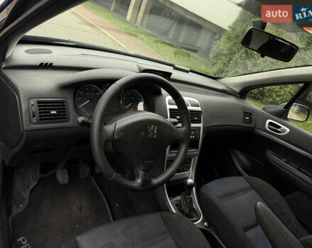 Синій Пежо 307, об'ємом двигуна 2 л та пробігом 208 тис. км за 3300 $, фото 18 на Automoto.ua