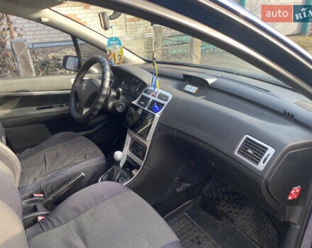 Синий Пежо 307, объемом двигателя 2 л и пробегом 231 тыс. км за 5300 $, фото 4 на Automoto.ua