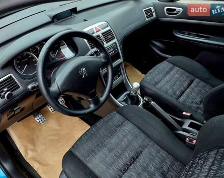 Синий Пежо 307, объемом двигателя 2 л и пробегом 265 тыс. км за 3550 $, фото 7 на Automoto.ua