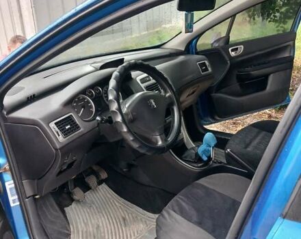 Синий Пежо 307, объемом двигателя 2 л и пробегом 265 тыс. км за 3650 $, фото 3 на Automoto.ua