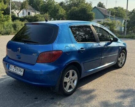 Синий Пежо 307, объемом двигателя 2 л и пробегом 235 тыс. км за 3900 $, фото 5 на Automoto.ua