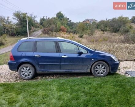Синий Пежо 307, объемом двигателя 1.59 л и пробегом 200 тыс. км за 3800 $, фото 2 на Automoto.ua