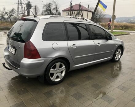 Синій Пежо 307, об'ємом двигуна 2 л та пробігом 380 тис. км за 3100 $, фото 3 на Automoto.ua