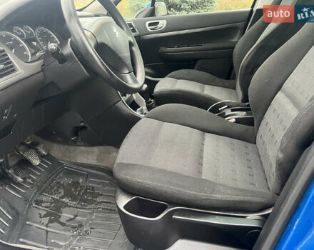 Синий Пежо 307, объемом двигателя 2 л и пробегом 267 тыс. км за 4200 $, фото 11 на Automoto.ua
