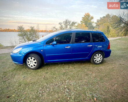 Синий Пежо 307, объемом двигателя 1.59 л и пробегом 336 тыс. км за 5000 $, фото 5 на Automoto.ua