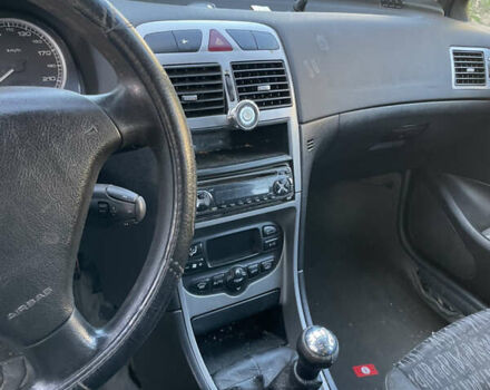 Синий Пежо 307, объемом двигателя 1.6 л и пробегом 300 тыс. км за 2800 $, фото 5 на Automoto.ua