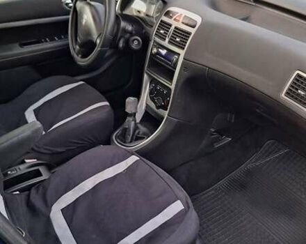 Синий Пежо 307, объемом двигателя 2 л и пробегом 455 тыс. км за 3200 $, фото 19 на Automoto.ua