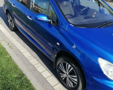 Синий Пежо 307, объемом двигателя 2 л и пробегом 240 тыс. км за 4500 $, фото 1 на Automoto.ua