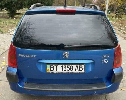 Синий Пежо 307, объемом двигателя 1.6 л и пробегом 150 тыс. км за 4900 $, фото 2 на Automoto.ua