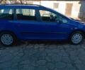 Синий Пежо 307, объемом двигателя 1.4 л и пробегом 300 тыс. км за 4100 $, фото 1 на Automoto.ua