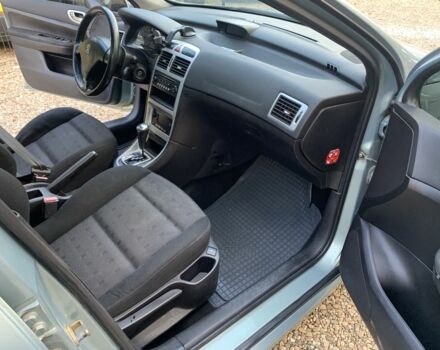Синий Пежо 307, объемом двигателя 2 л и пробегом 234 тыс. км за 4850 $, фото 12 на Automoto.ua