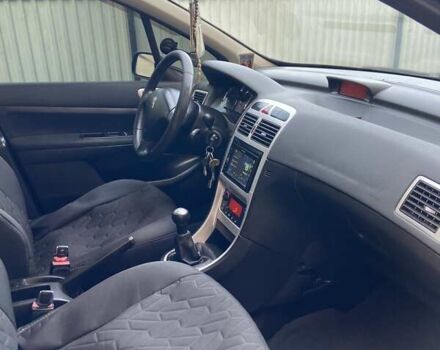 Синий Пежо 307, объемом двигателя 1.59 л и пробегом 230 тыс. км за 4300 $, фото 4 на Automoto.ua