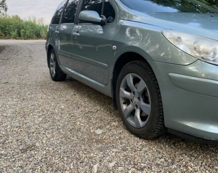 Синий Пежо 307, объемом двигателя 2 л и пробегом 234 тыс. км за 4850 $, фото 2 на Automoto.ua