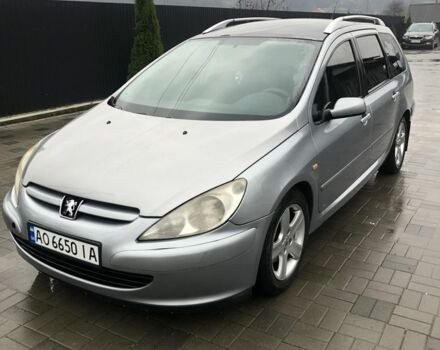 Синий Пежо 307, объемом двигателя 2 л и пробегом 380 тыс. км за 3100 $, фото 1 на Automoto.ua