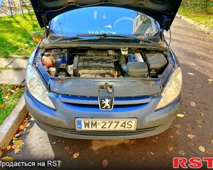 Синий Пежо 307, объемом двигателя 1.6 л и пробегом 320 тыс. км за 2400 $, фото 1 на Automoto.ua