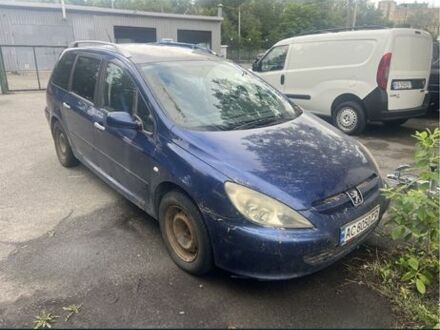 Синий Пежо 307, объемом двигателя 2 л и пробегом 412 тыс. км за 2000 $, фото 1 на Automoto.ua