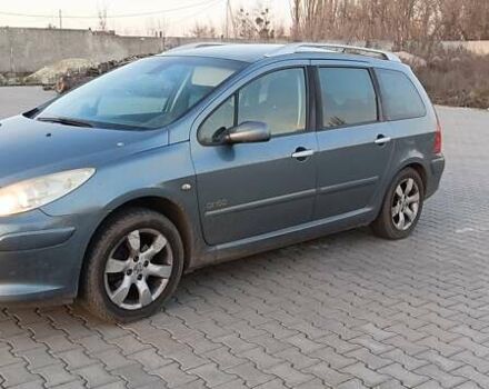 Синий Пежо 307, объемом двигателя 1.6 л и пробегом 252 тыс. км за 5199 $, фото 1 на Automoto.ua