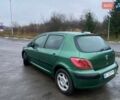 Зеленый Пежо 307, объемом двигателя 2 л и пробегом 424 тыс. км за 3000 $, фото 4 на Automoto.ua