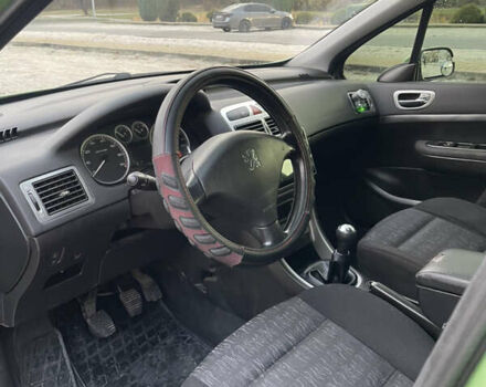Зеленый Пежо 307, объемом двигателя 1.59 л и пробегом 228 тыс. км за 3500 $, фото 11 на Automoto.ua