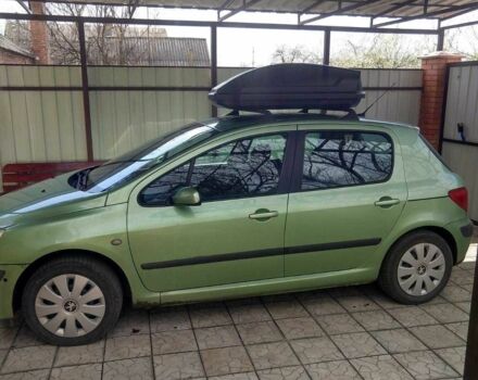 Зеленый Пежо 307, объемом двигателя 2 л и пробегом 270 тыс. км за 3000 $, фото 1 на Automoto.ua