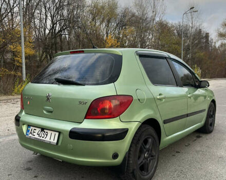 Зеленый Пежо 307, объемом двигателя 1.59 л и пробегом 228 тыс. км за 3399 $, фото 4 на Automoto.ua