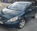 Зеленый Пежо 307, объемом двигателя 2 л и пробегом 237 тыс. км за 3800 $, фото 1 на Automoto.ua