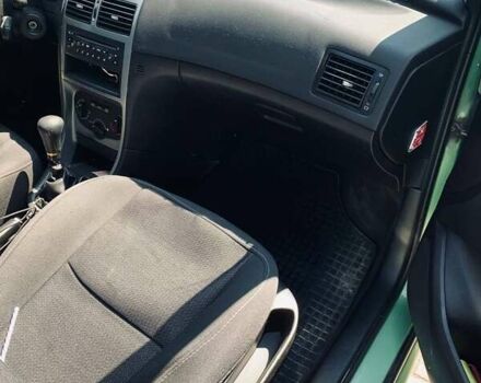 Зеленый Пежо 307, объемом двигателя 1.36 л и пробегом 237 тыс. км за 3500 $, фото 6 на Automoto.ua