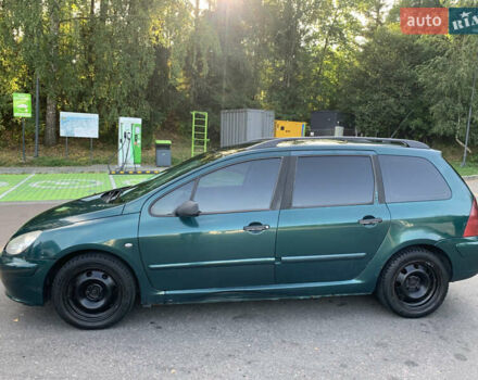 Зелений Пежо 307, об'ємом двигуна 2 л та пробігом 400 тис. км за 1999 $, фото 4 на Automoto.ua