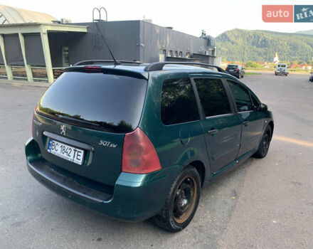 Зелений Пежо 307, об'ємом двигуна 2 л та пробігом 400 тис. км за 1999 $, фото 7 на Automoto.ua