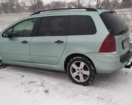 Зелений Пежо 307, об'ємом двигуна 2 л та пробігом 258 тис. км за 3750 $, фото 20 на Automoto.ua