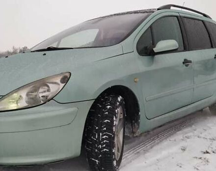 Зелений Пежо 307, об'ємом двигуна 2 л та пробігом 258 тис. км за 3750 $, фото 18 на Automoto.ua