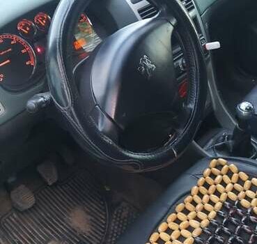 Зелений Пежо 307, об'ємом двигуна 2 л та пробігом 258 тис. км за 3750 $, фото 5 на Automoto.ua