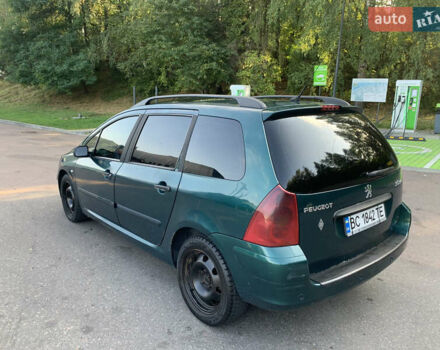 Зелений Пежо 307, об'ємом двигуна 2 л та пробігом 400 тис. км за 1999 $, фото 5 на Automoto.ua