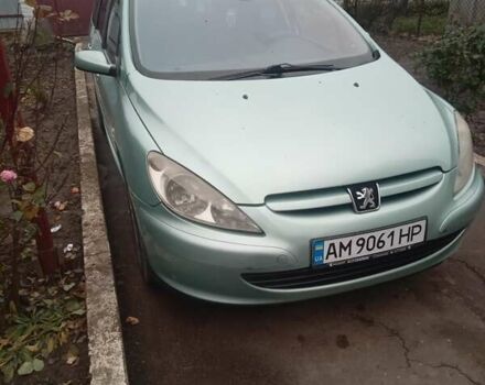 Зелений Пежо 307, об'ємом двигуна 1.59 л та пробігом 300 тис. км за 3799 $, фото 3 на Automoto.ua