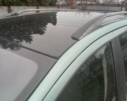 Зелений Пежо 307, об'ємом двигуна 1.59 л та пробігом 300 тис. км за 3799 $, фото 7 на Automoto.ua