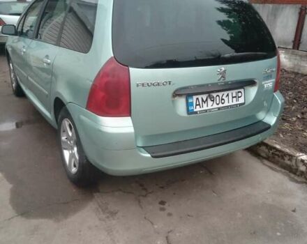 Зелений Пежо 307, об'ємом двигуна 1.59 л та пробігом 300 тис. км за 3799 $, фото 4 на Automoto.ua