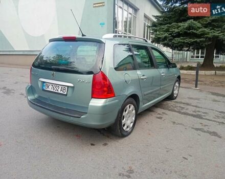 Зеленый Пежо 307, объемом двигателя 1.59 л и пробегом 282 тыс. км за 3900 $, фото 6 на Automoto.ua