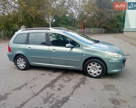 Зеленый Пежо 307, объемом двигателя 1.59 л и пробегом 282 тыс. км за 3900 $, фото 7 на Automoto.ua