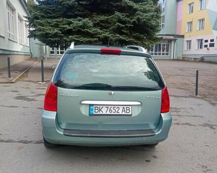 Зеленый Пежо 307, объемом двигателя 1.59 л и пробегом 282 тыс. км за 3900 $, фото 2 на Automoto.ua
