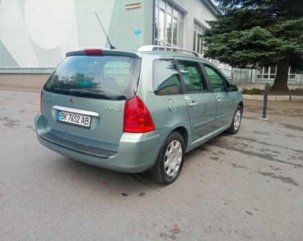 Зеленый Пежо 307, объемом двигателя 1.6 л и пробегом 282 тыс. км за 3900 $, фото 3 на Automoto.ua
