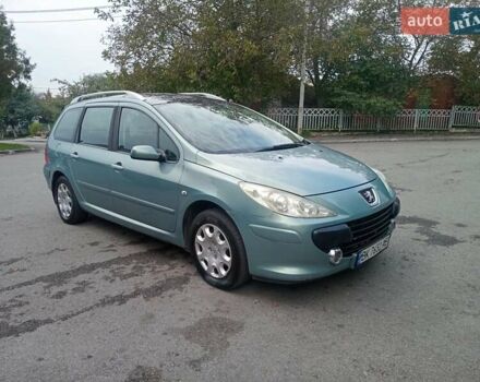 Зеленый Пежо 307, объемом двигателя 1.59 л и пробегом 282 тыс. км за 3900 $, фото 5 на Automoto.ua