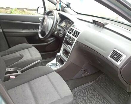 Зеленый Пежо 307, объемом двигателя 1.59 л и пробегом 282 тыс. км за 3900 $, фото 16 на Automoto.ua