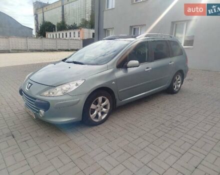 Зелений Пежо 307, об'ємом двигуна 2 л та пробігом 350 тис. км за 3500 $, фото 6 на Automoto.ua