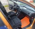 Оранжевый Пежо 307, объемом двигателя 2 л и пробегом 318 тыс. км за 3300 $, фото 5 на Automoto.ua