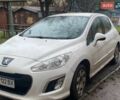Белый Пежо 308, объемом двигателя 1.56 л и пробегом 320 тыс. км за 4500 $, фото 1 на Automoto.ua