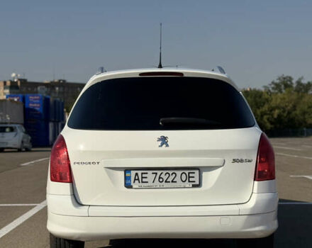 Белый Пежо 308, объемом двигателя 1.6 л и пробегом 183 тыс. км за 8000 $, фото 5 на Automoto.ua