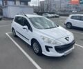 Белый Пежо 308, объемом двигателя 1.4 л и пробегом 241 тыс. км за 3900 $, фото 1 на Automoto.ua