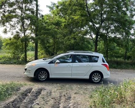 Белый Пежо 308, объемом двигателя 1.6 л и пробегом 202 тыс. км за 5700 $, фото 6 на Automoto.ua
