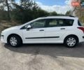 Белый Пежо 308, объемом двигателя 1.4 л и пробегом 196 тыс. км за 4100 $, фото 1 на Automoto.ua